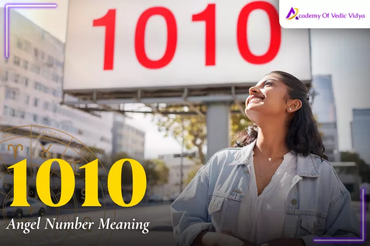 A woman smiles while standing outdoors in front of a large sign displaying the number 1010, with text reading “1010 Angel Number Meaning".